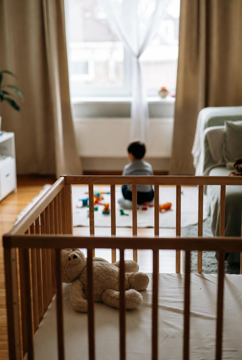 child-safe play area with shelves, mats, and natural light